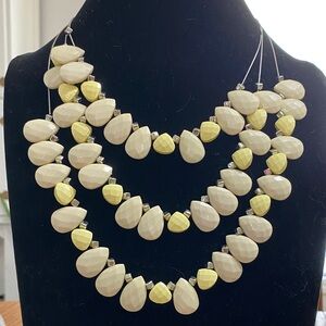 Charming Charlie Layered Teardrop Necklace in Cream and Yellow